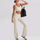 Wholesale Women's Open-Back Long Sleeve Crop Top & High Waist Leggings Set with Chest Pad