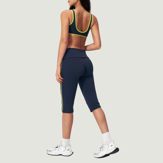 Wholesale color-blocked V-neck sports bra & striped cropped pants set
