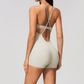 Wholesale Women's Cross-Back Yoga Bodysuit – Brushed Slim Fit Athletic Shorts Jumpsuit w/ Chest Pad