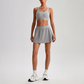 Wholesale Naked-Feel Sports Bra & Pleated Tennis Skirt Set – Quick-Dry Athletic 2-Piece with Built-In Shorts
