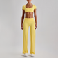 Wholesale Women's Short Sleeve Exposed Back Bra+Naked Feel Straight Leg Pants Yoga Set