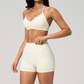 Wholesale Women's Halter Neck Sports Bra & High-Waist Booty Shorts Set – Seam-Detail Quick-Dry 2-Piece Yoga Set