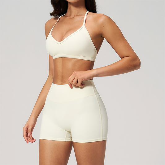 Wholesale Women's Halter Neck Sports Bra & High-Waist Booty Shorts Set – Seam-Detail Quick-Dry 2-Piece Yoga Set