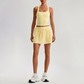 Wholesale Sleeveless Sports Top & Pleated Tennis Skirt Set – Quick-Dry Athletic 2-Piece with Built-In Shorts