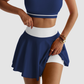 Wholesale contrasting color sports bra + patchwork skirt