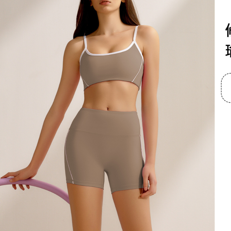 Women's yoga tank top and white-trimmed running shorts two-piece set