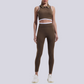 A seamless round neck sleeveless zip bra and sports pants two-piece set