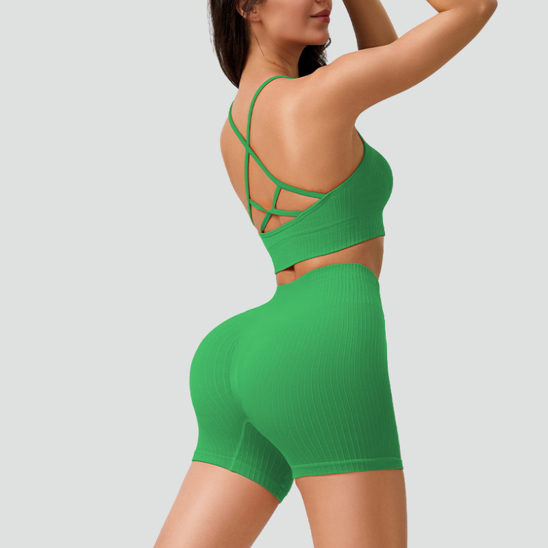 Women's thin strap sports bra and yoga shorts two-piece set.