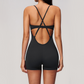 Wholesale Women's Cross-Back Yoga Bodysuit – Brushed Slim Fit Athletic Shorts Jumpsuit w/ Chest Pad