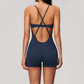 Wholesale Women's Cross-Back Yoga Bodysuit – Brushed Slim Fit Athletic Shorts Jumpsuit w/ Chest Pad