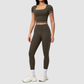 Wholesale Women's Seam-Detail Short Sleeve Crop Top + High-Waist Leggings Set – Butt-Lifting Yoga Gym Activewear
