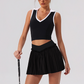 Wholesale Women's Halter Neck Sports Bra & Pleated Mini Skirt Set with Chest Pad