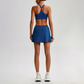 Wholesale Naked-Feel Sports Bra & Pleated Tennis Skirt Set – Quick-Dry Athletic 2-Piece with Built-In Shorts